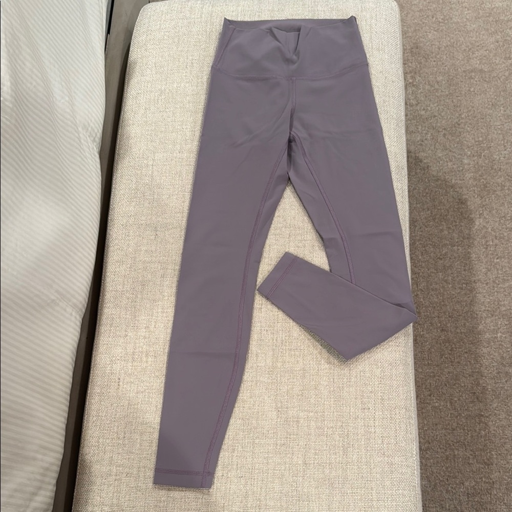 Lululemon size 4 light Purple lavender High-Waisted Leggings. Excellent! No pill